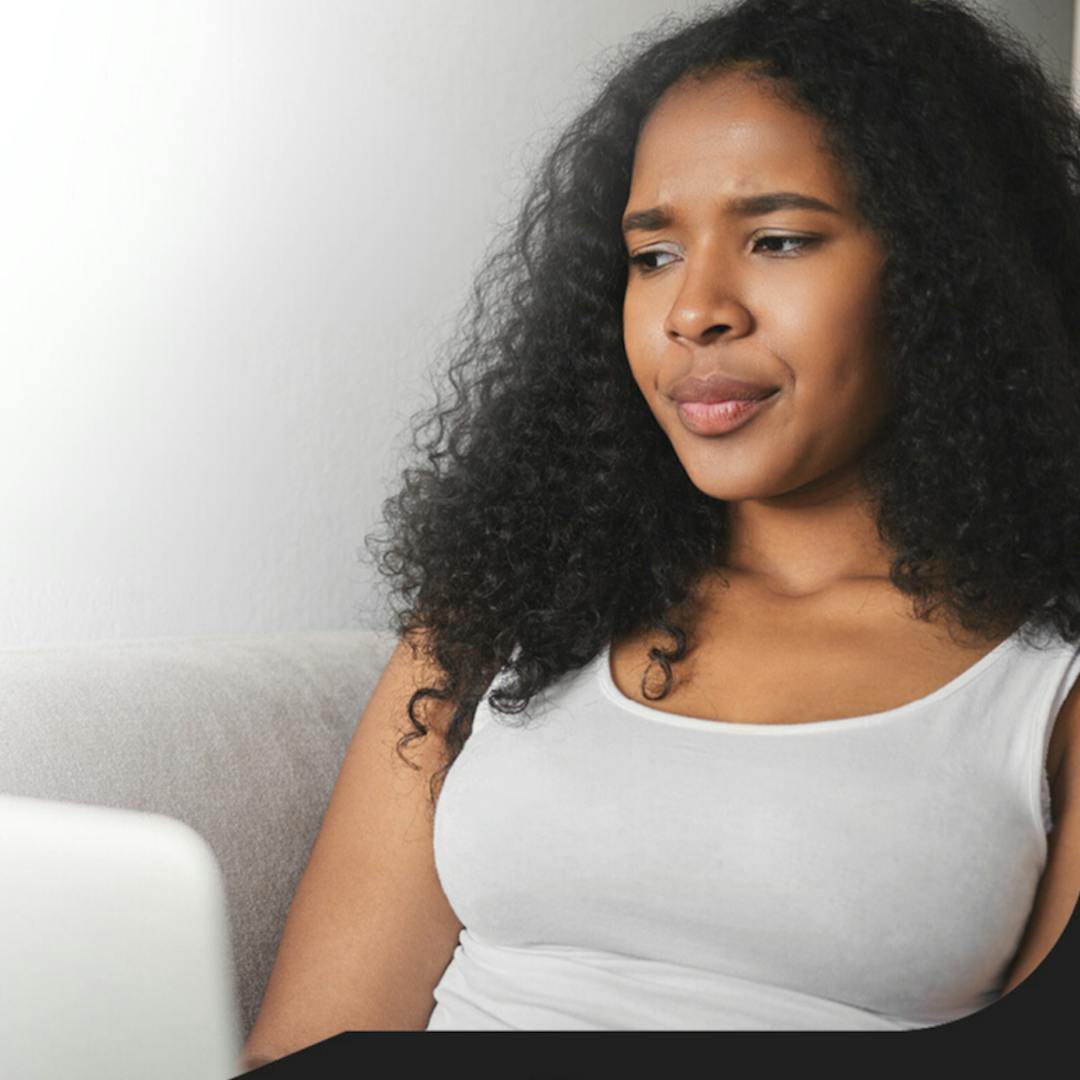 Photo of woman looking at a laptop.The words Domestic Abuse Services, what are your views, with KCC & End Domestic Abuse logo