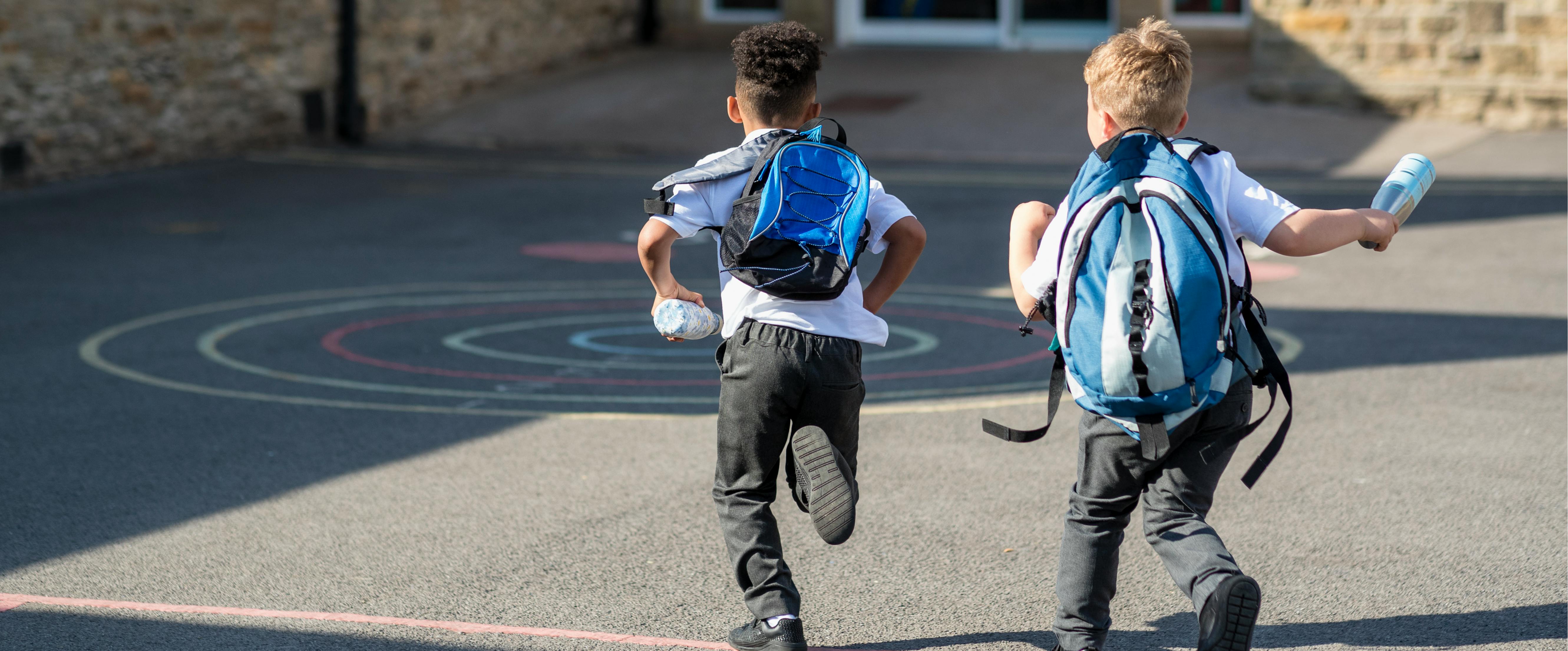 children running into school