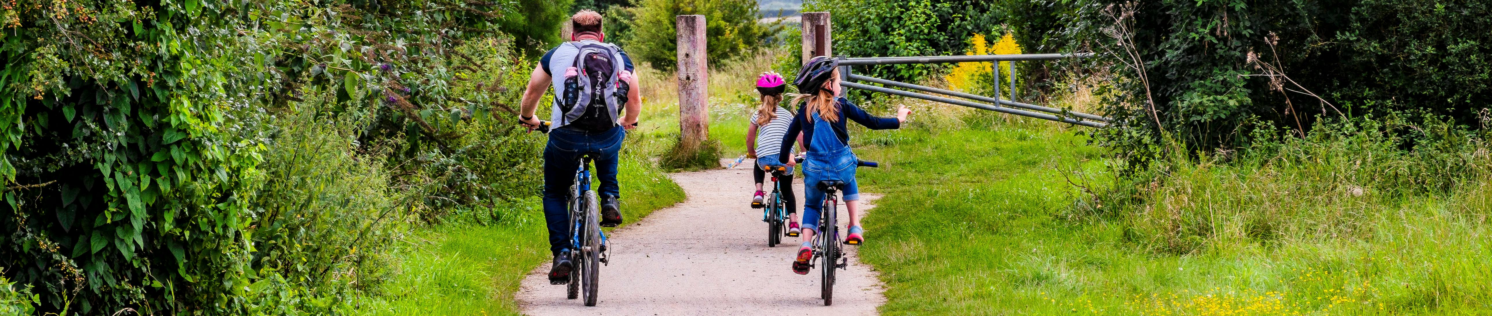 Family cycling on cycle path