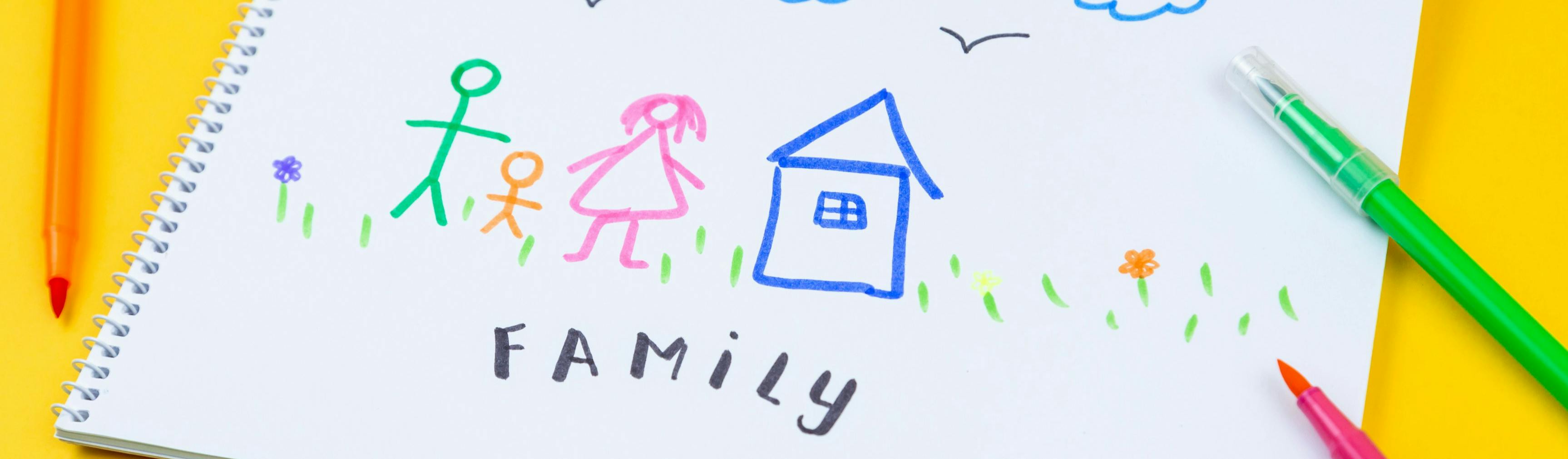 Child's drawing of a house with family
