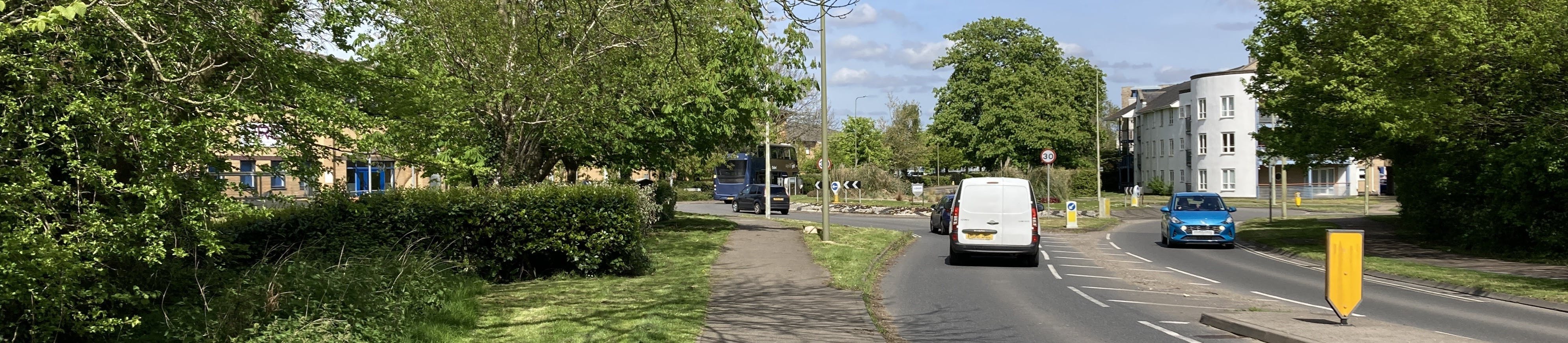 London Rd and Rodney House roundabout with traffic island right hand front, roundabout mid-distance, flats right hand back