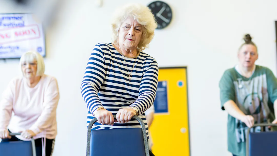 woman doing strength and balance exercise in Worthing