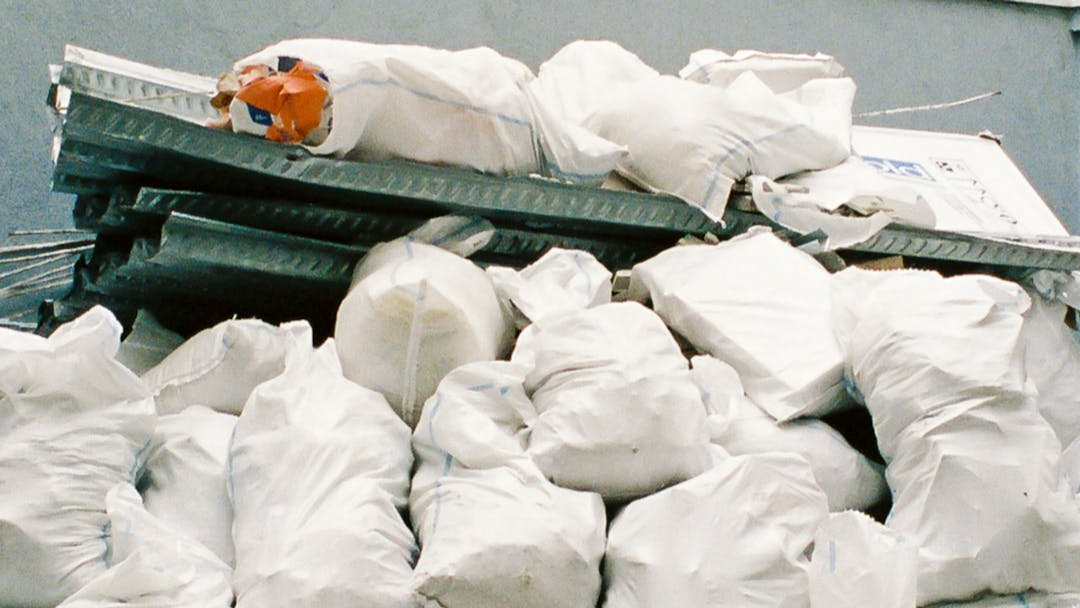 Bags of rubbish and waste materials,