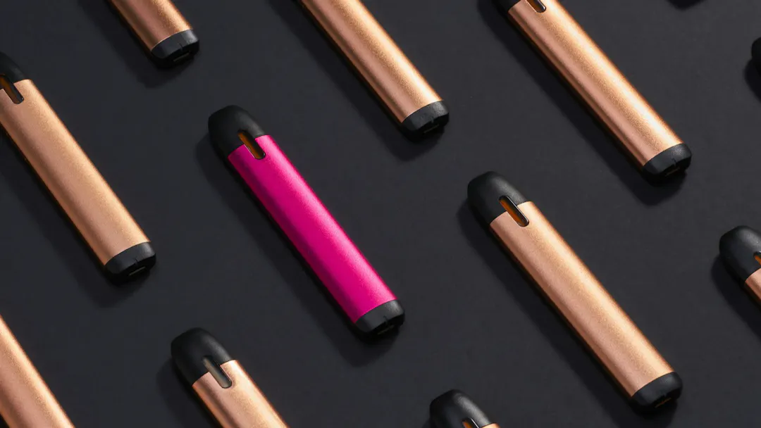 Photo of vapes on a black surface