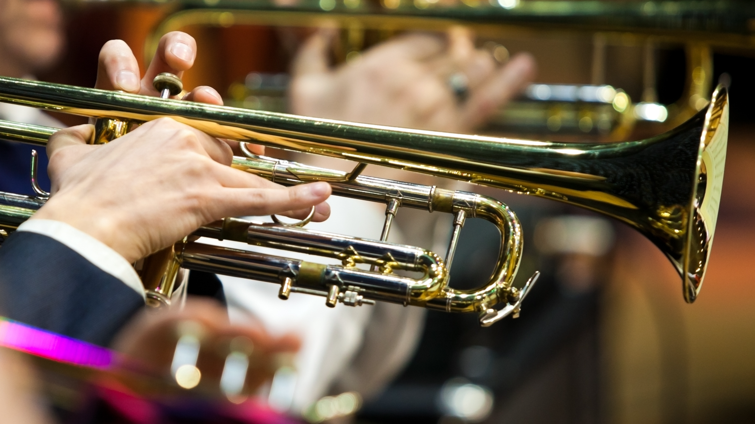 Photograph depicting hand playing on trumped