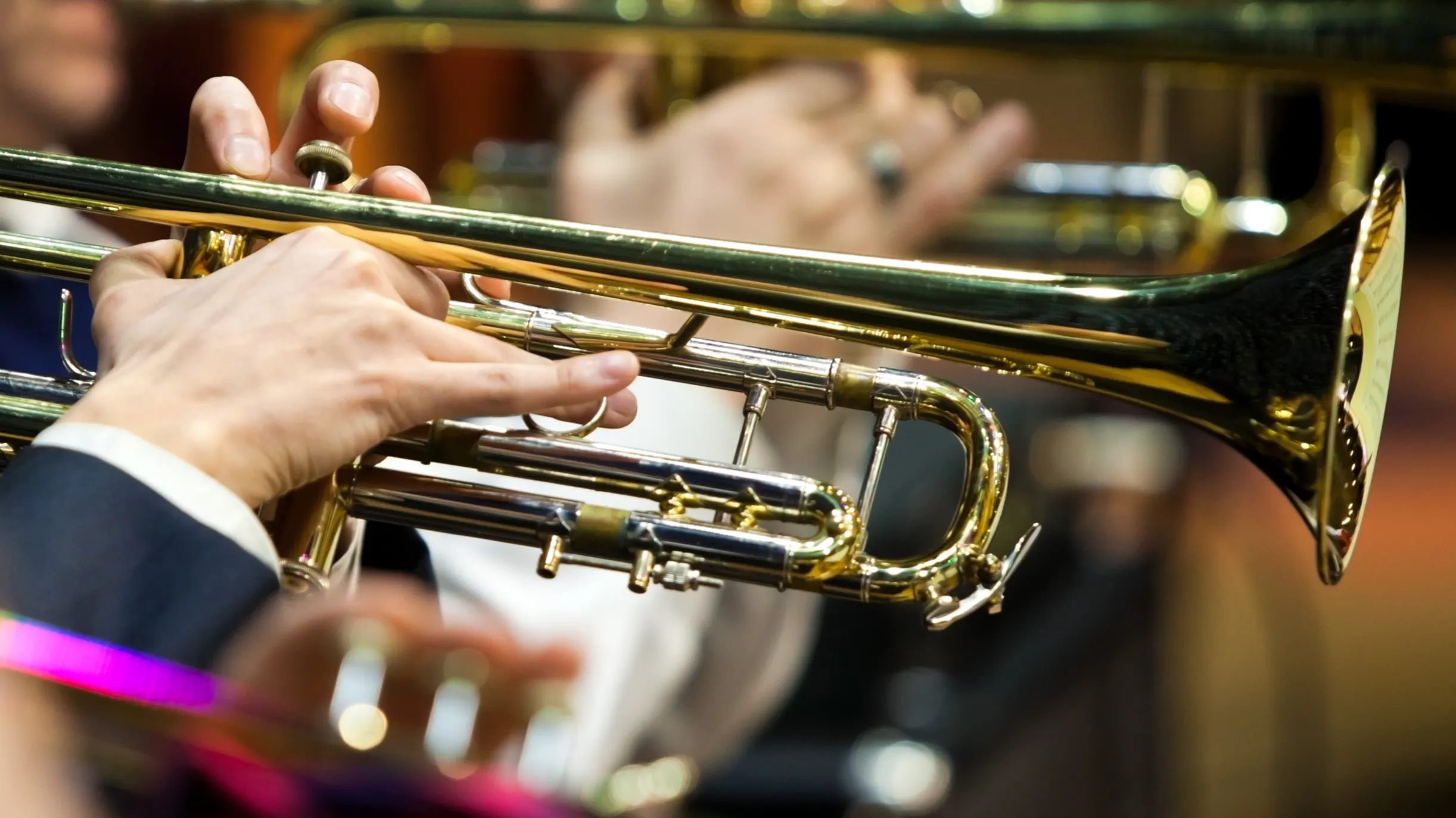 Photograph depicting hand playing on trumped