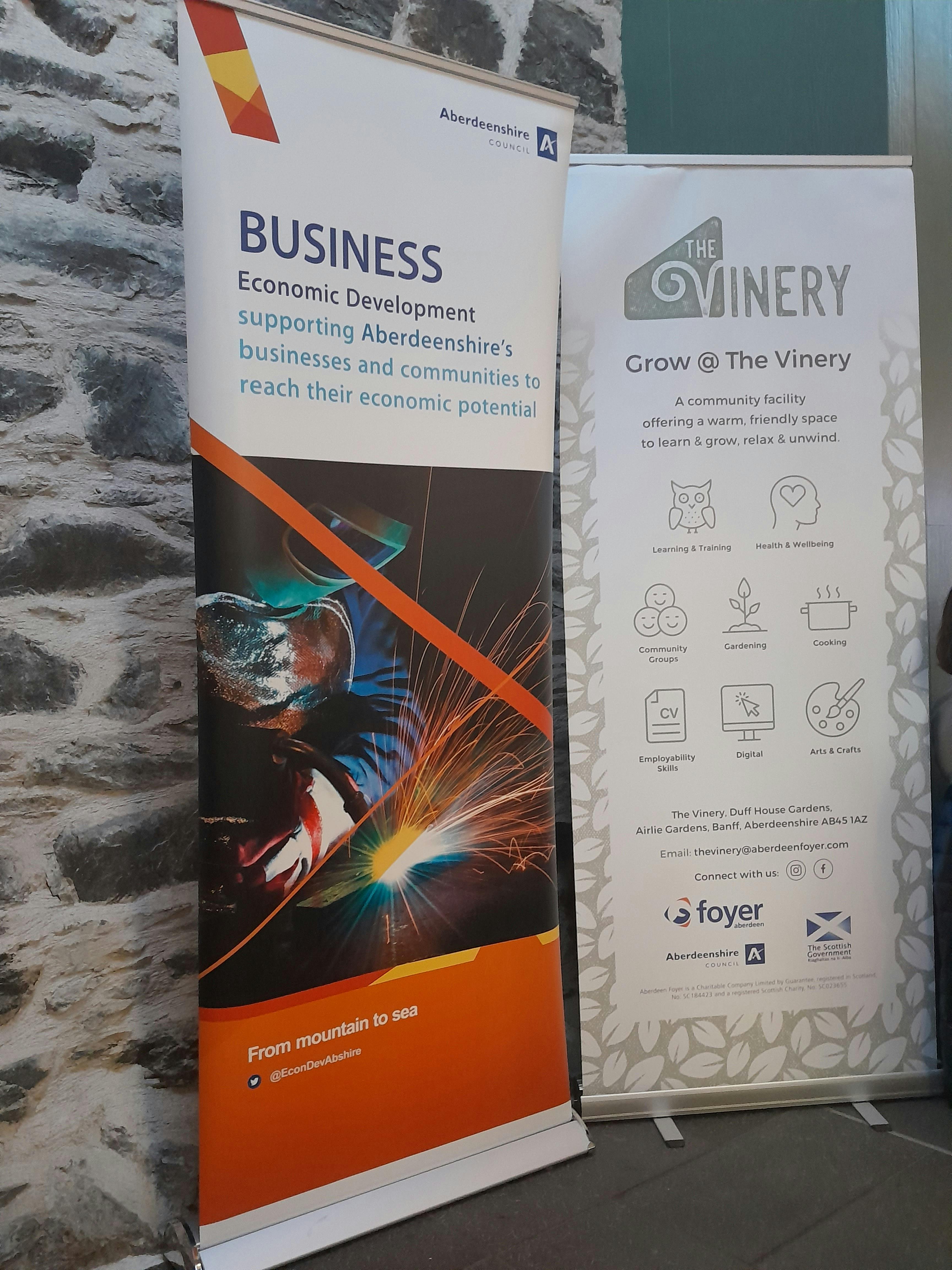 Picture shows an economic development banner and the Vinery, Banff banner