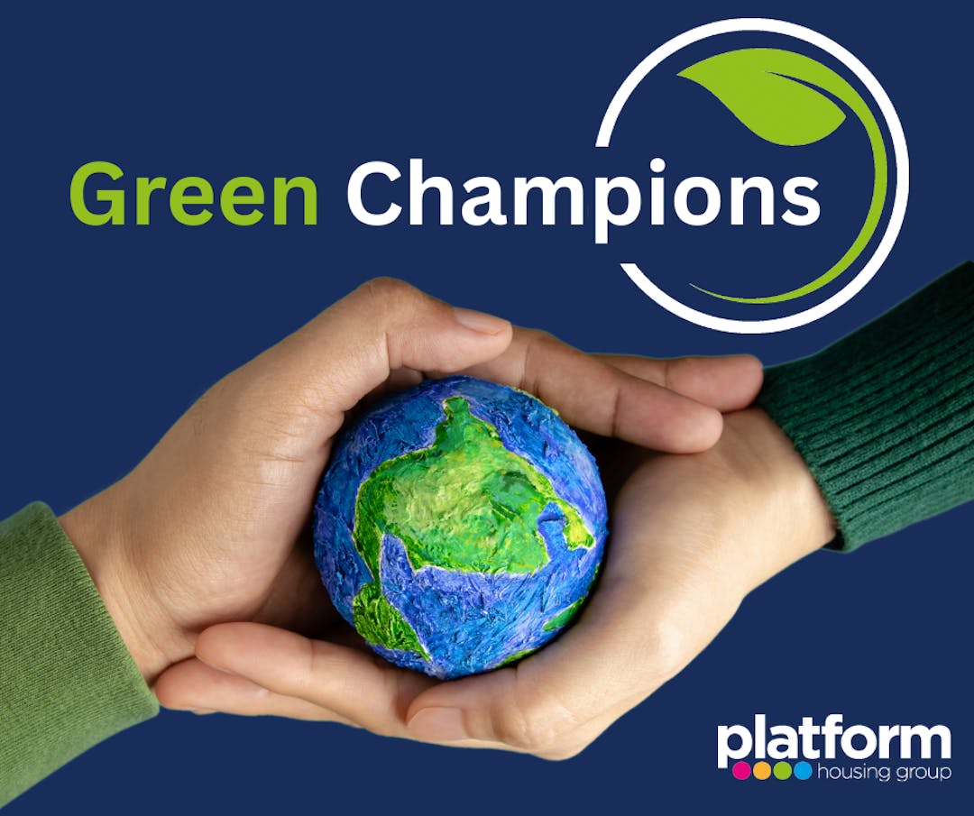 2 hands clasping a small model of planet Earth