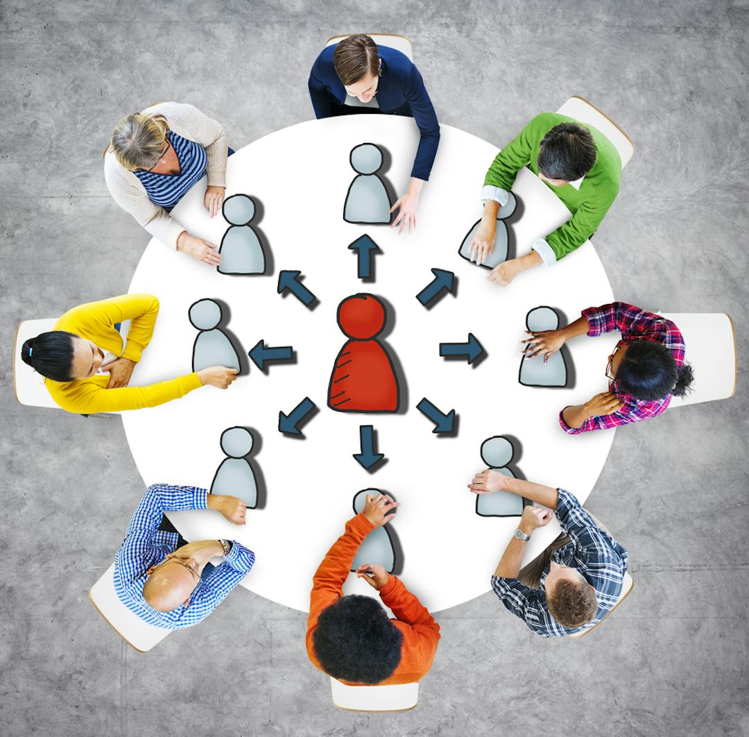 people working around a table