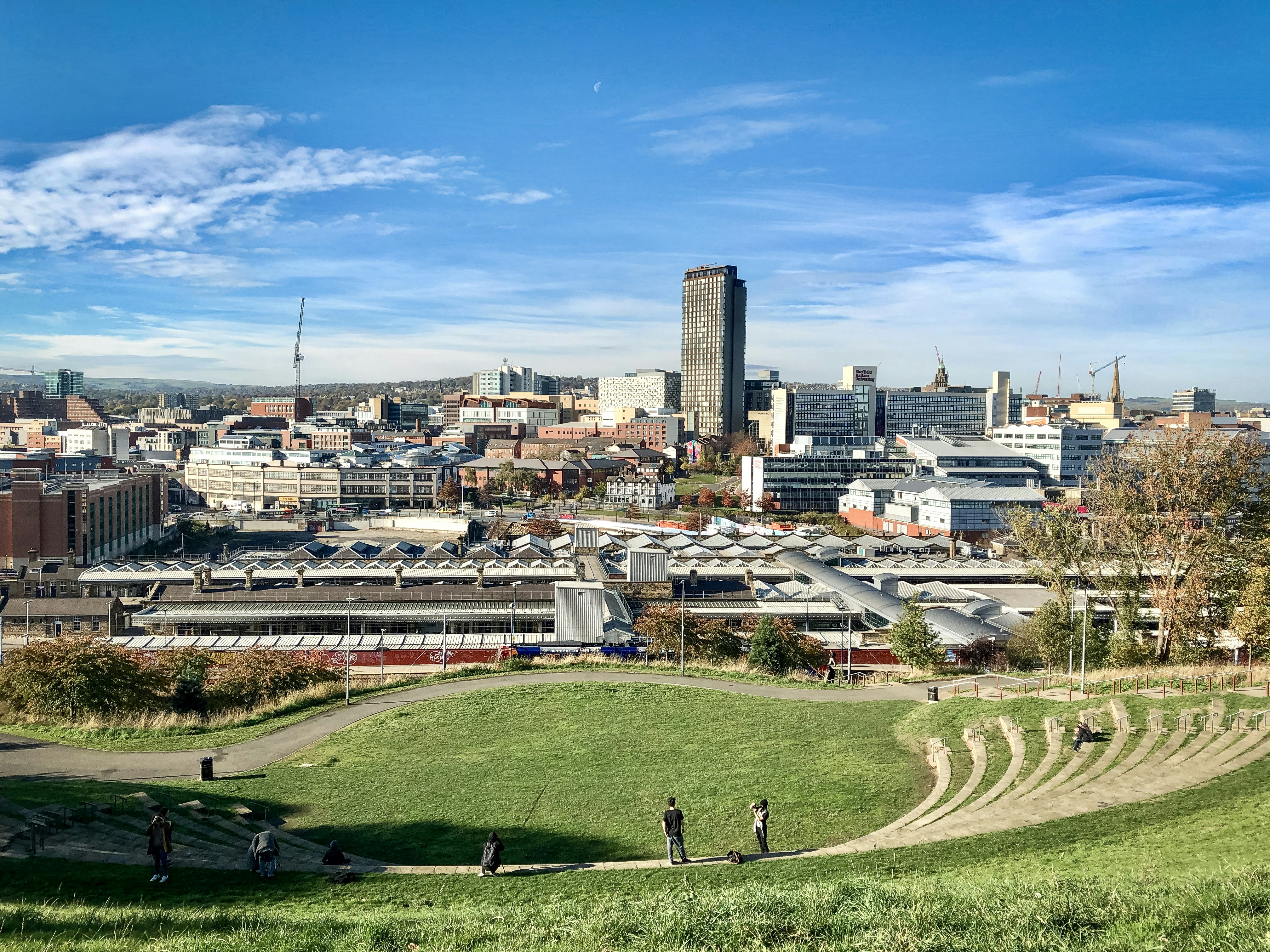 Image of Sheffield city centre with the train station in  the foreground