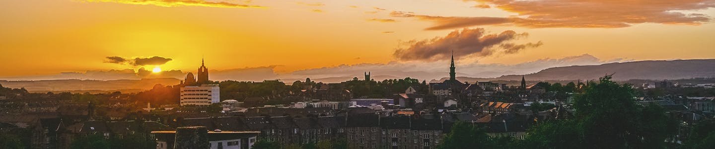 Image of the sunset over Paisley skyline