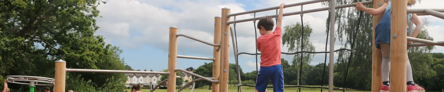 Photo of children playing on climbing frame at Decoy Park in Newton Abbot