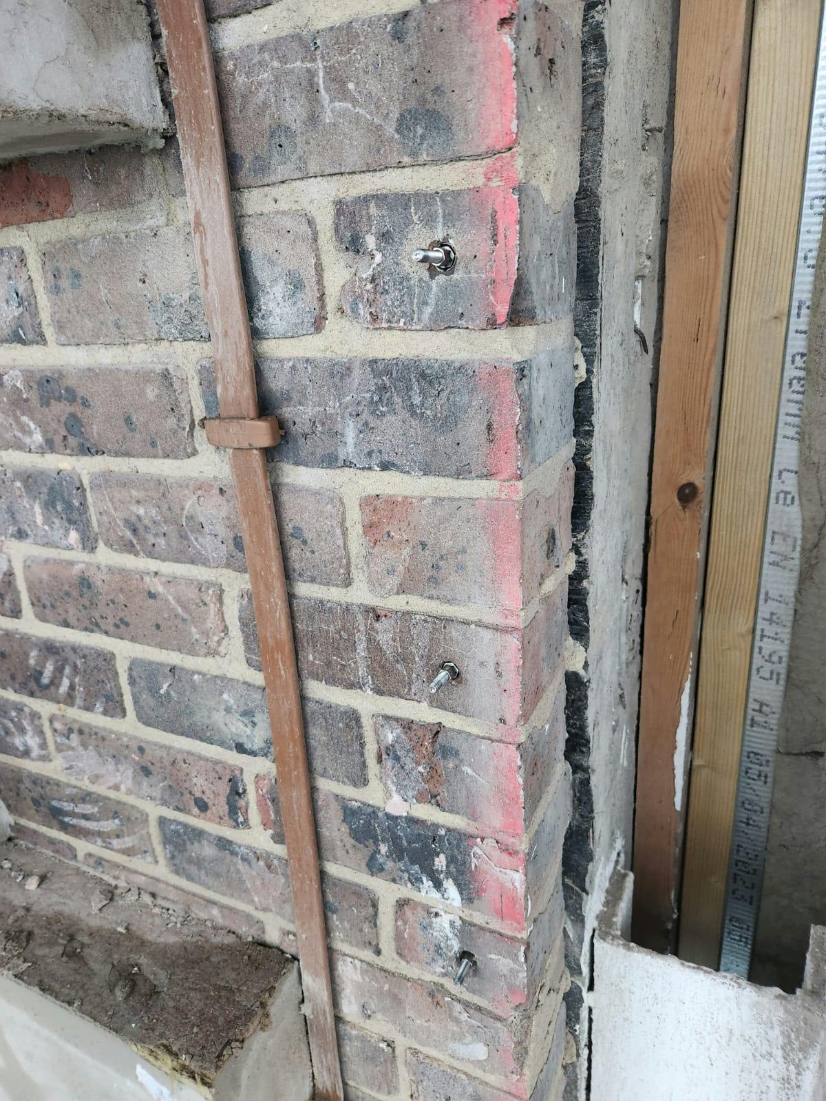 Specially engineered brick ties to concrete slab_Sep23