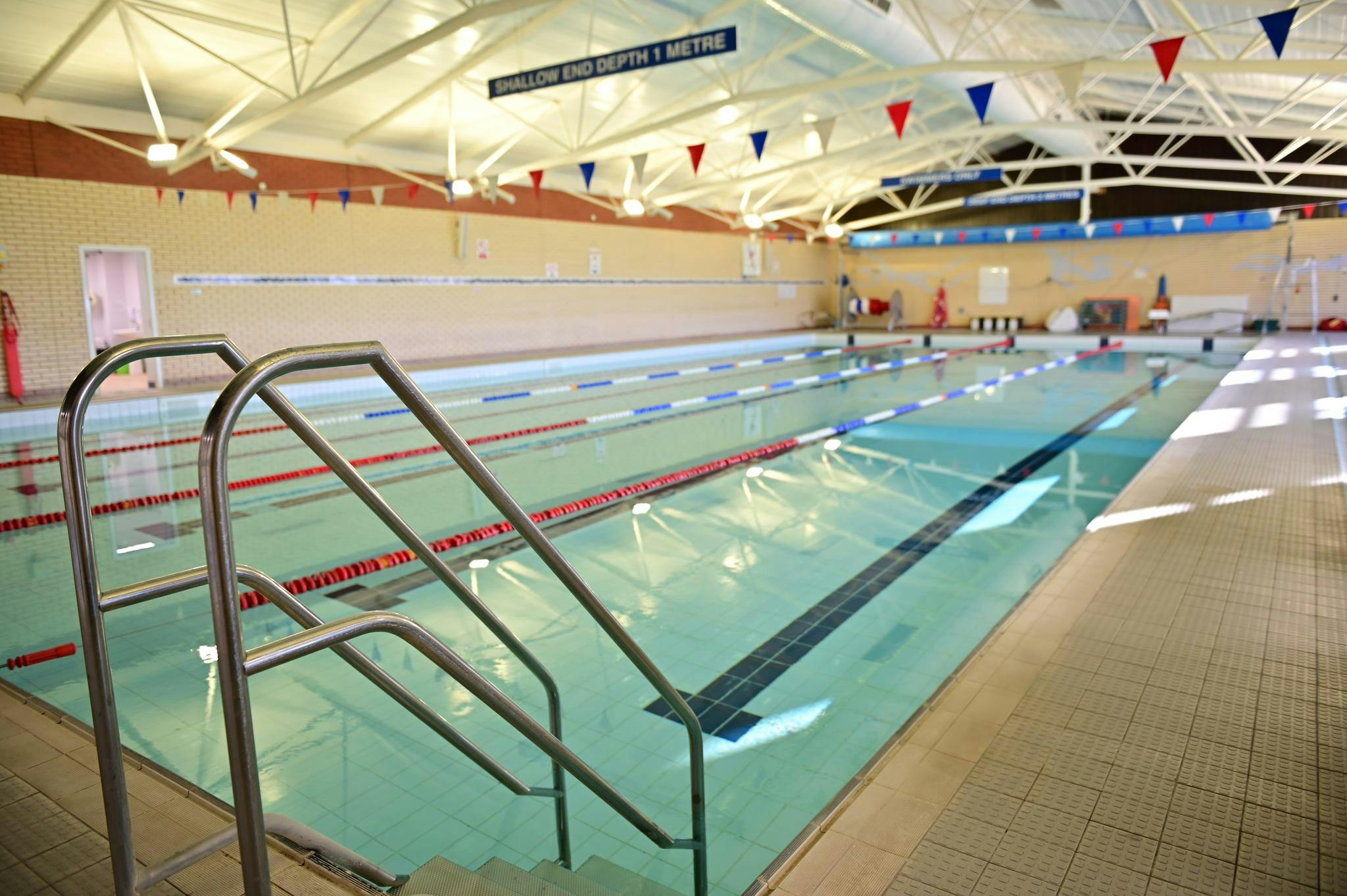 Indoor swimming pool with lanes at Dawlish Leisure Centre.