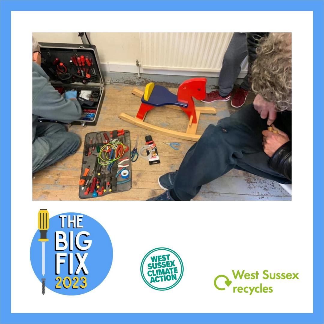a man fixing some toys with the Big Fix 2023 Logo, West Sussex Recycles logo and West Sussex Climate Action Logo underneath