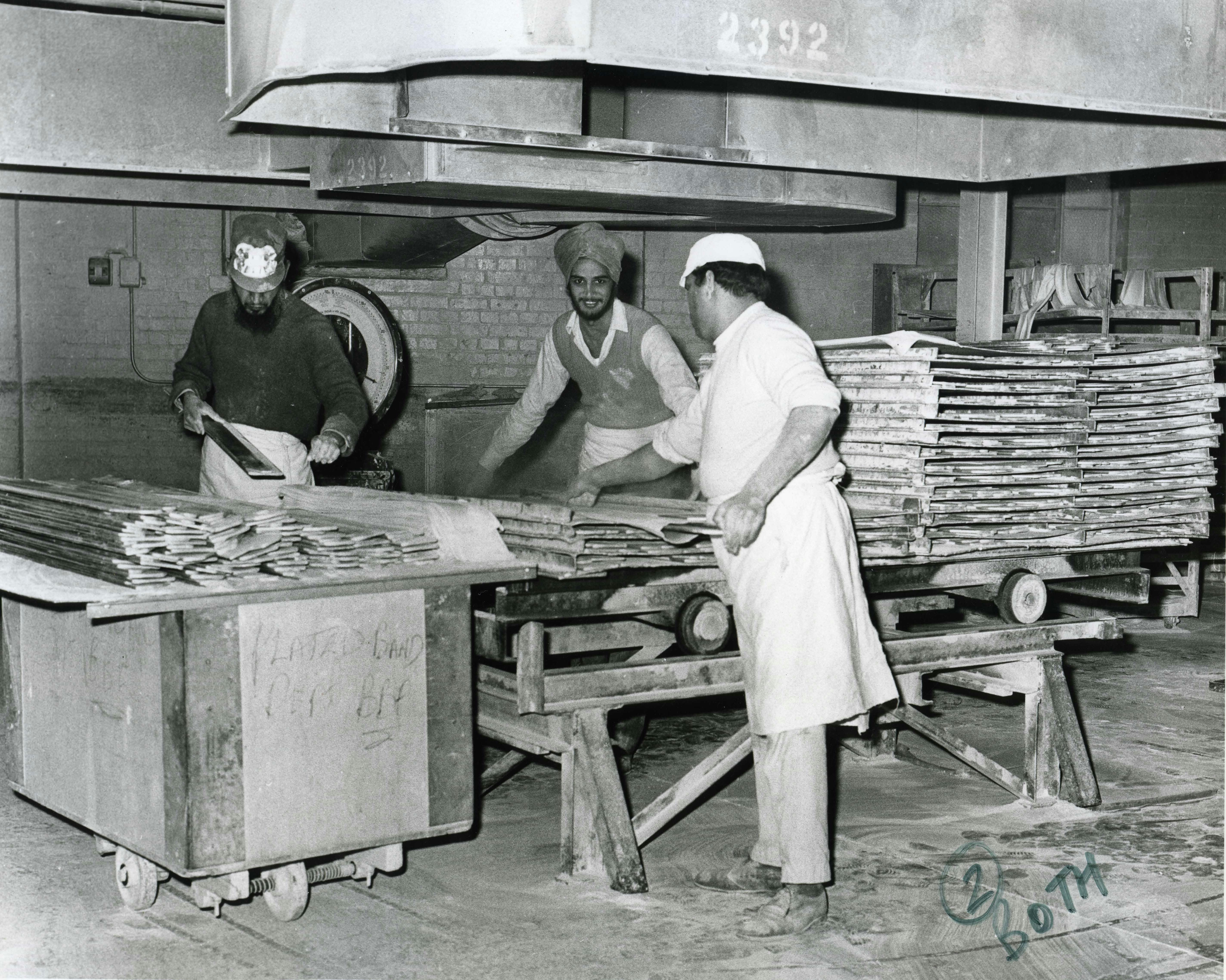 Three workers with rubber at William Warne's from LBBD Archives