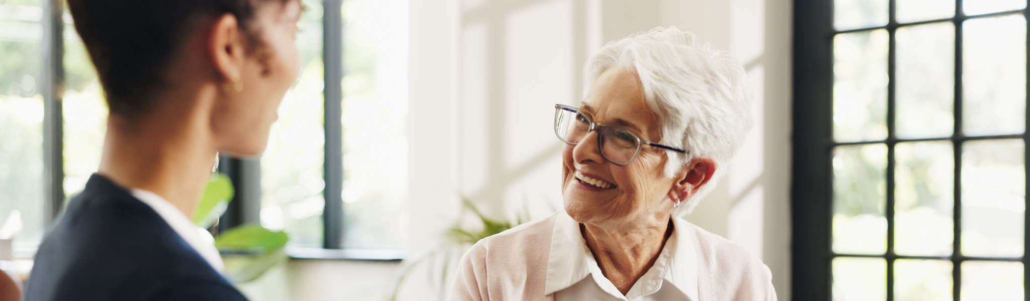 image of a lady receiving help from the adult advocacy service 