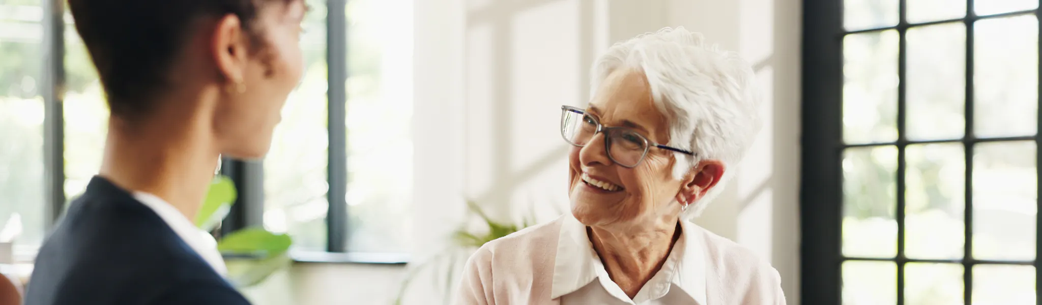 image of a lady receiving help from the adult advocacy service 