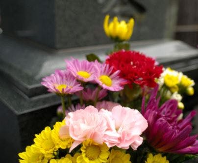 Generic photo of flowers on a grave