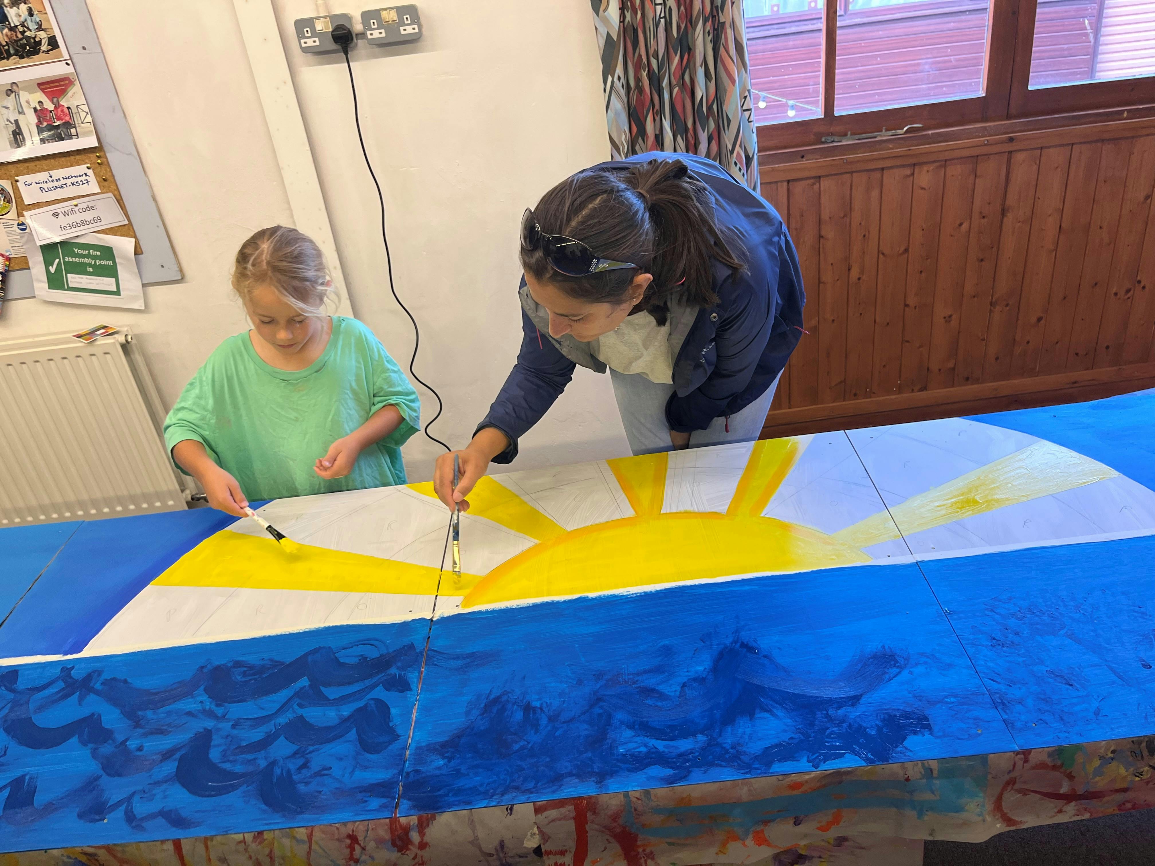 Painting the People's Panels at the public workshop 14 October 2023