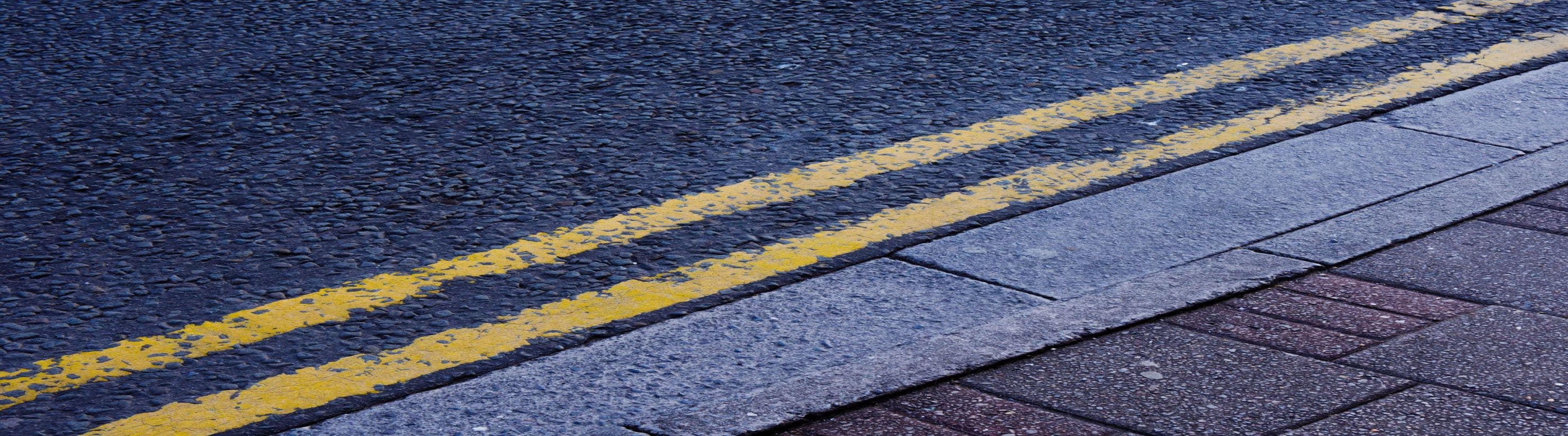 Photo of double yellow lines on road.