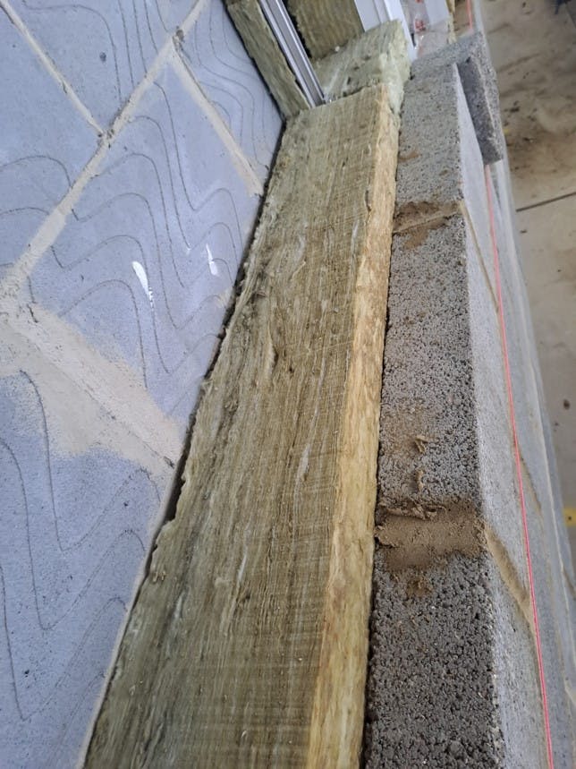 170mm insulation installed between blockwork_Dec23
