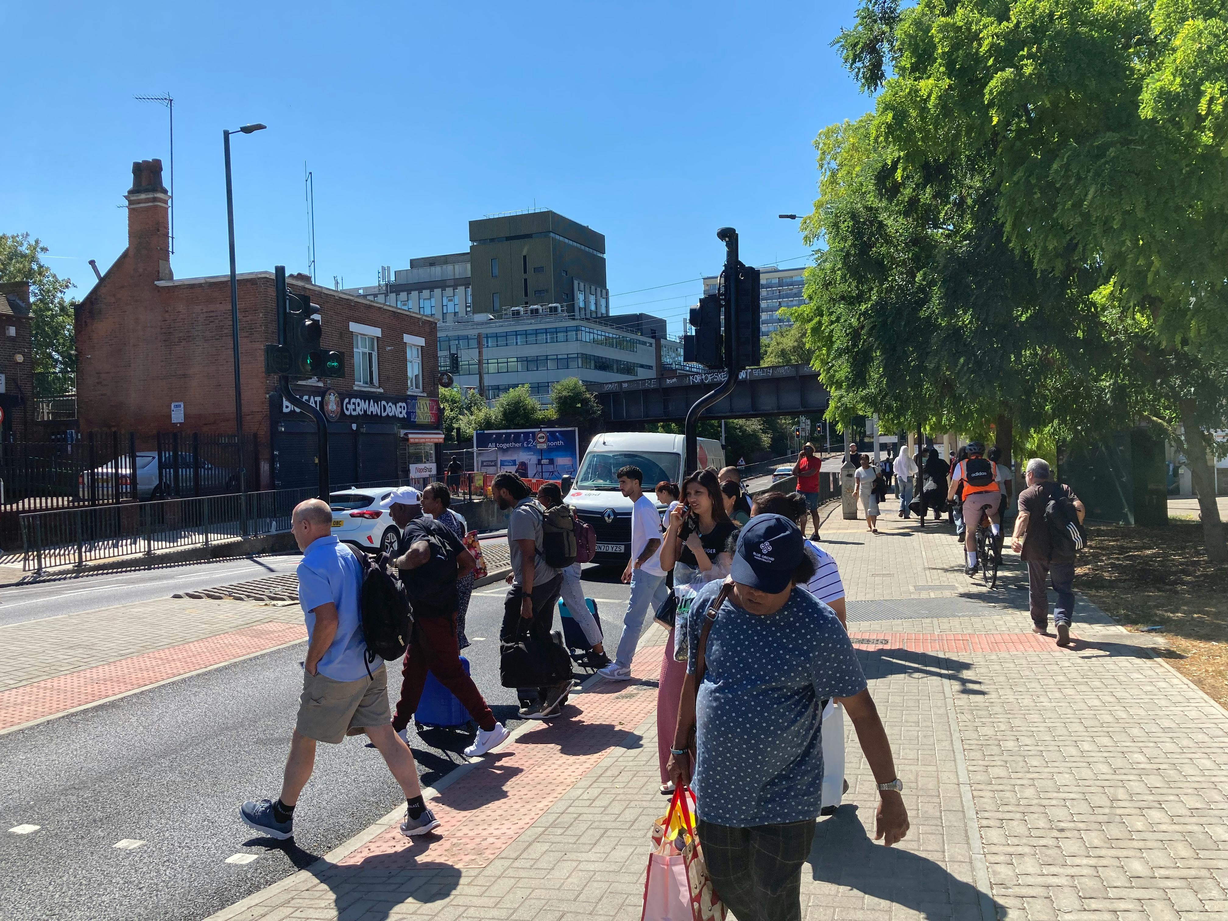 People crossing over the new Sterling Way crossing