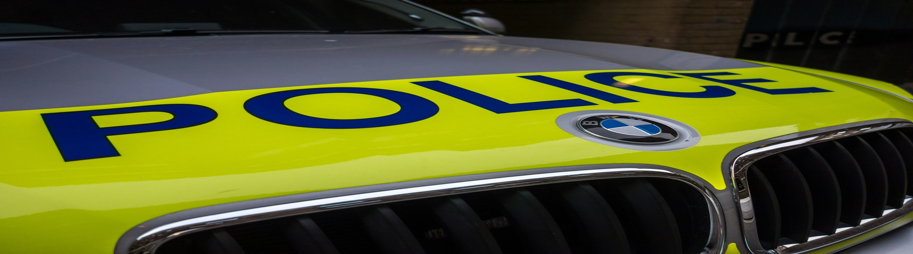 Photo of police car bonnet.