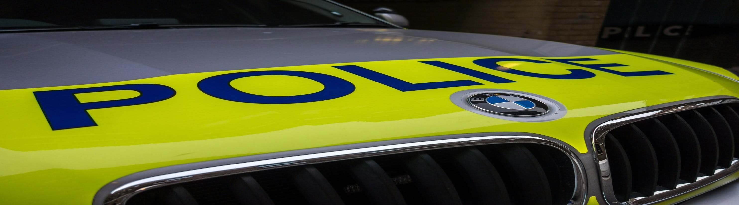 Photo of police car bonnet.