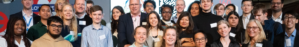 The Youth Panel standing in a group at the London Transport Museum following the launch of their "Tomorrow's TfL" report