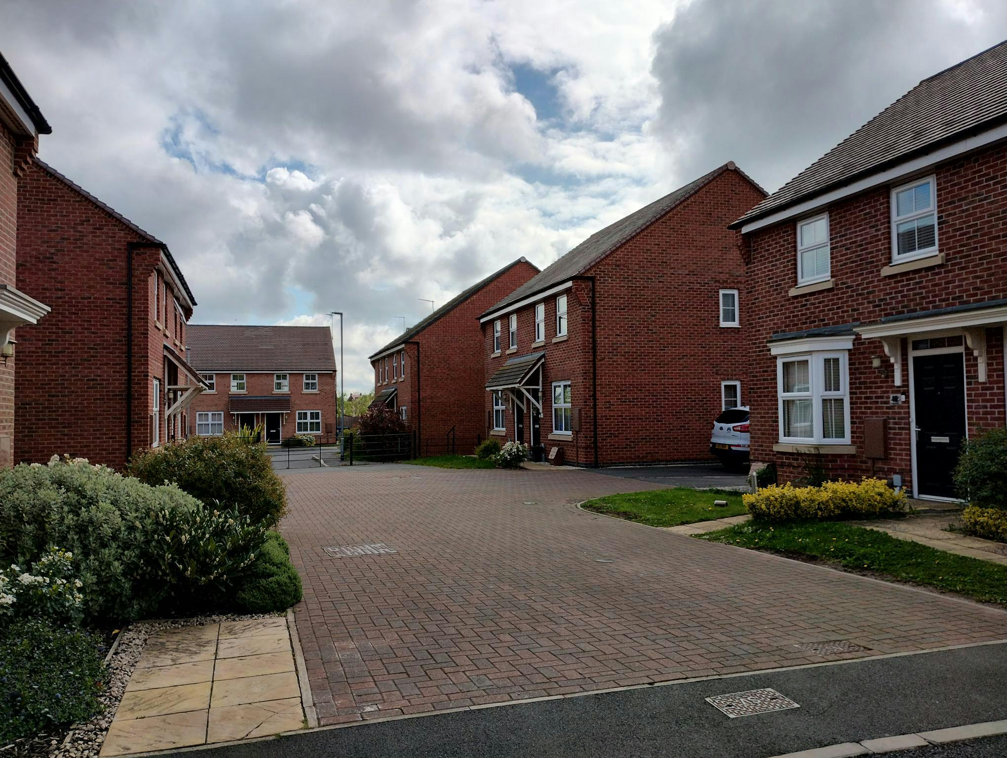 Your Voice Bassetlaw with a drawing of a woman in front of a house