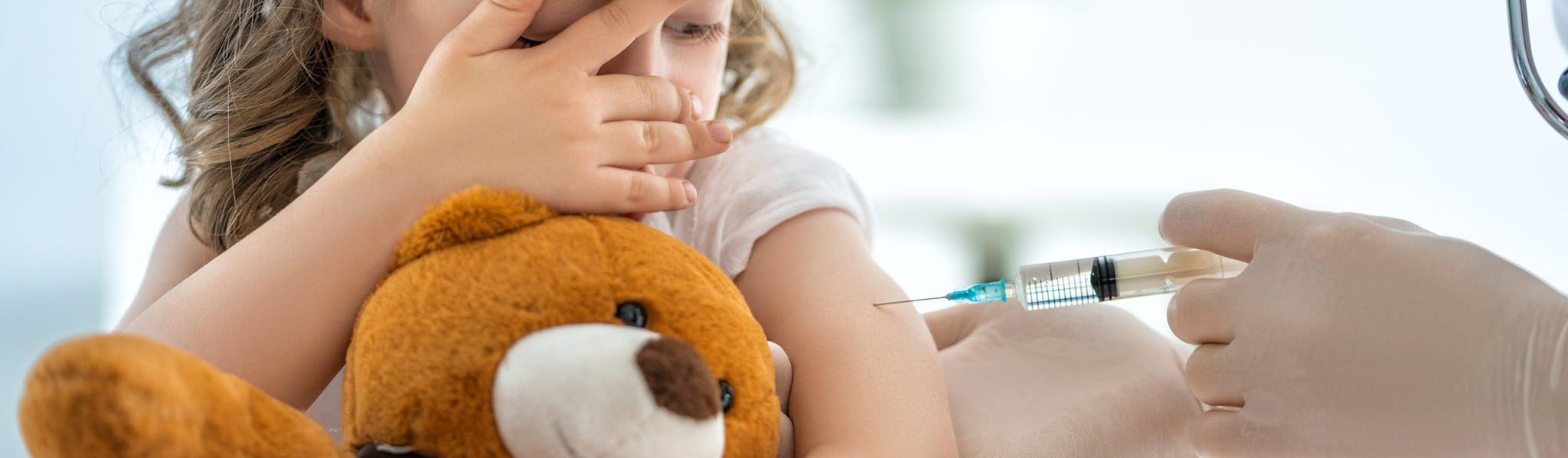 An image of a child receiving a vaccination  