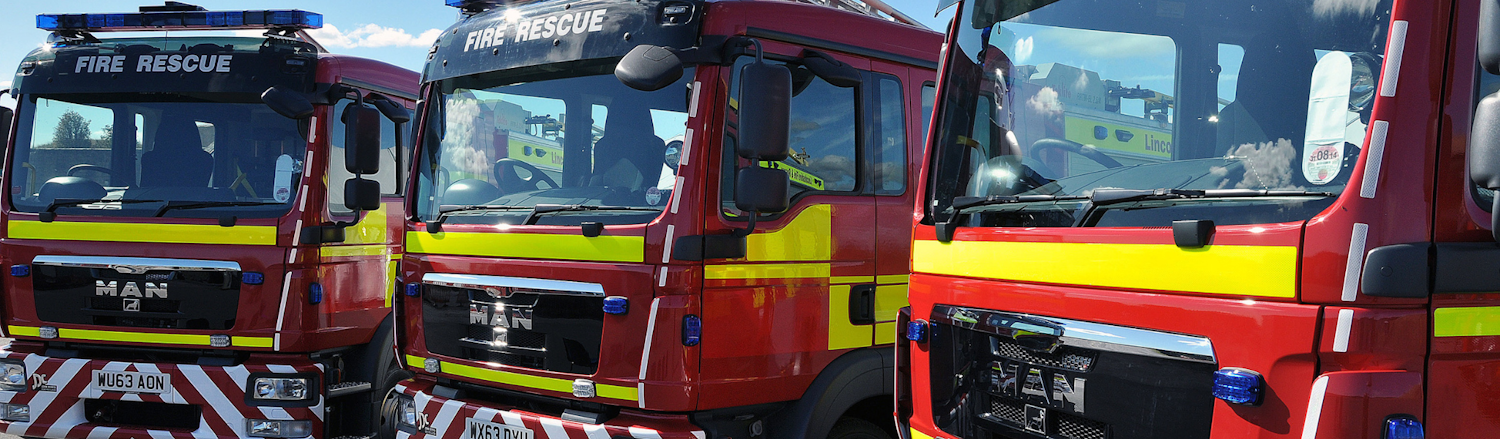 An image of three fire engine appliances