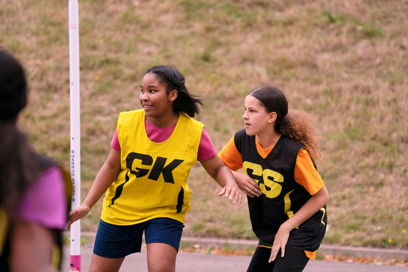 Young women playing netball photograph