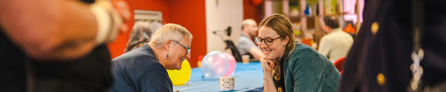Image of a group of adults at a community centre