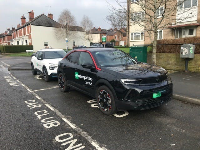 Photograph of two car club vehicles on Kedleston Road