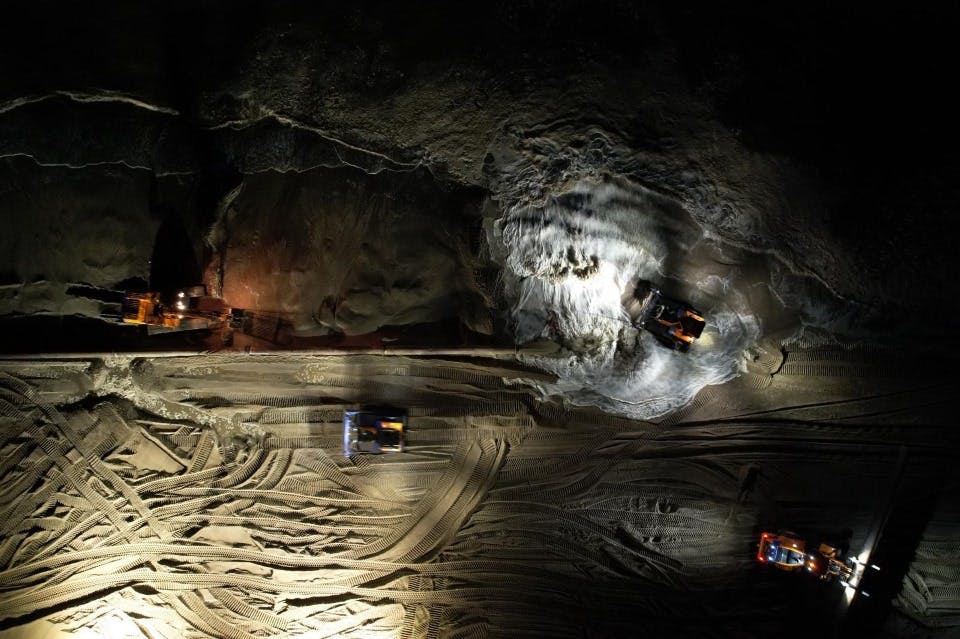                                         Machinery moves sand during a nightime beach nourishment pump