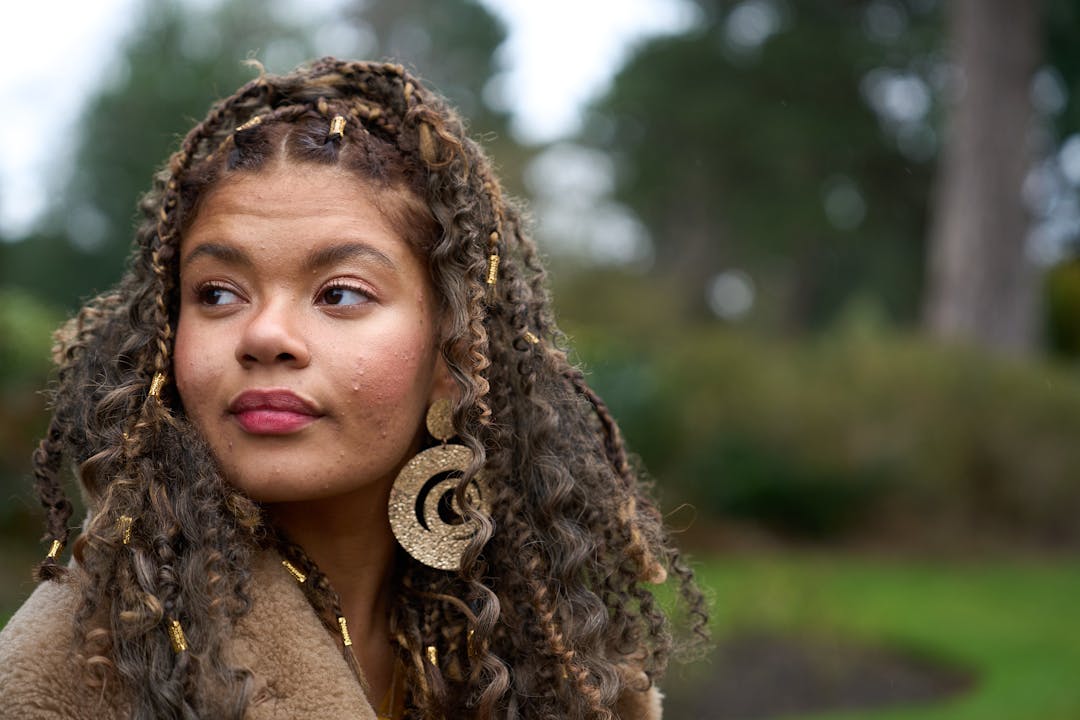 Young campaigner looking away from camera