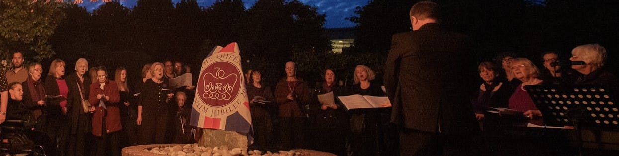 Jubilee choir singing at Three rivers House Rose gardens 