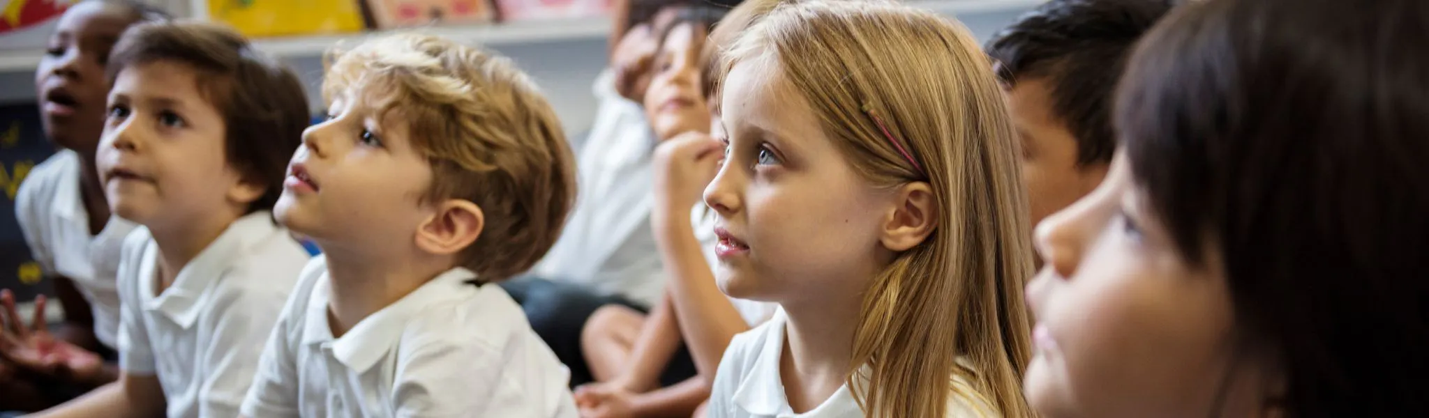 Group of students sitting on the floor